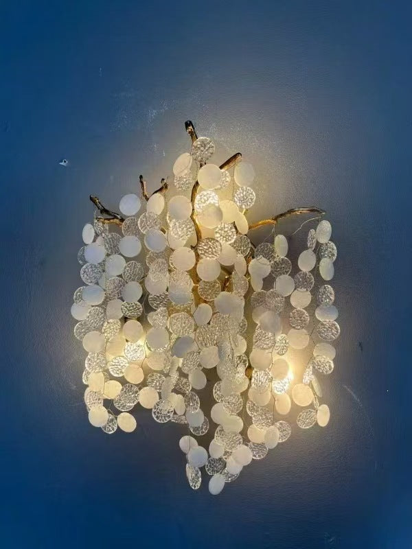 Lustre à branches en cuivre et cristaux