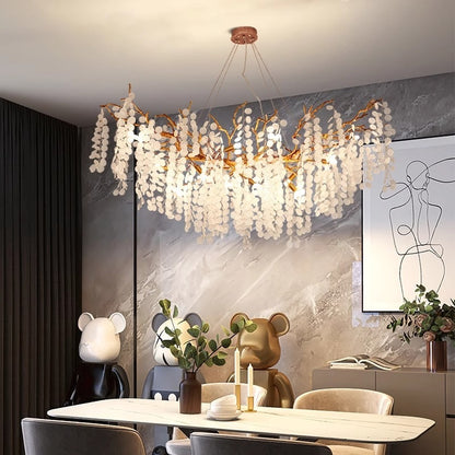 Lustre à branches en cuivre et cristaux